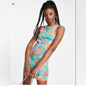 ASOS DESIGN knitted mini dress in multi floral pattern